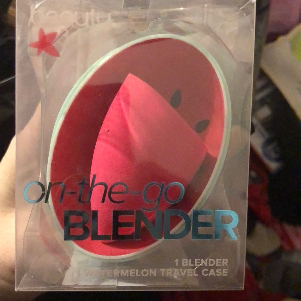 On the go blender into a watermelon